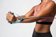 © rawpixel.com - Sporty woman using a resistance band