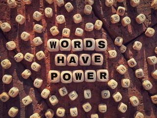 Wall Mural - Motivational and inspirational wording. WORDS HAVE POWER written on wooden blocks.