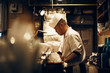 © hideo tsuto - 開店前に仕込みをする料理人