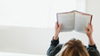 © rawpixel.com - Woman reading a book on her bed during coronavirus quarantine