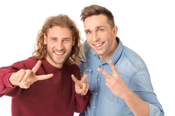 Wall Mural - Friends taking selfie on white background