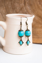 Wall Mural - Indian bohemian earrings. Turquoise bronze earrings. Handmade jewelry.