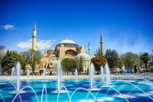 Water Fountain And Hagia Sophia Against Clear Blue Sky