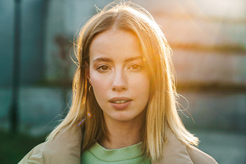 Canvas Print - Portrait closeup of young blonde woman posing and looking at camera