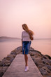 © antonburkhan - Blonde model on the beach at summer