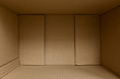 © sutichak - empty inside brown box carton paper package open packing