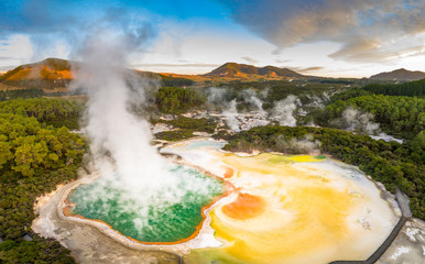 Geothermal Landscape with hot boiling mud and sulphur springs due to volcanic activity in Wai-O-Tapu, Thermal Wonderland New Zealand