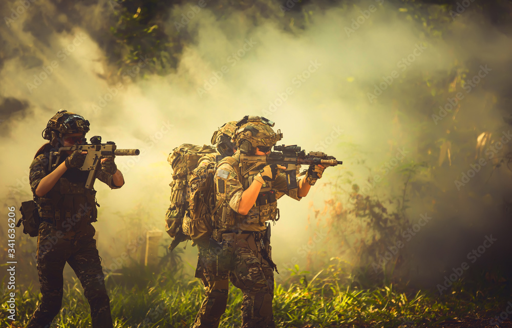 Special forces. soldier assault rifle with silencer. sniper in the ...
