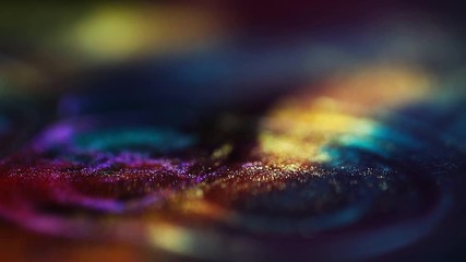 Wall Mural - Festive bokeh glitters background video. Abstract glowing backdrop with circles in motion. Footage with liquid twinkling particles. Colored and bright flowing animation with glowing effect