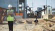 © Gorodenkoff - Specialist Controlling Drone on Construction Site. Architectural Engineer or Inspector Fly Drone on Building Construction Site Controlling Quality. Focus on Drone