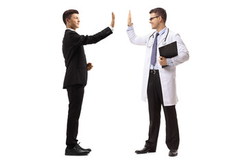 Poster - Suit and a doctor gesturing high-five