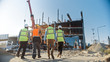 © Gorodenkoff - Diverse Team of Specialists Inspect Commercial, Industrial Building Construction Site. Real Estate Project with Civil Engineer, Investor and Worker. In the Background Crane, Skyscraper Formwork Frames