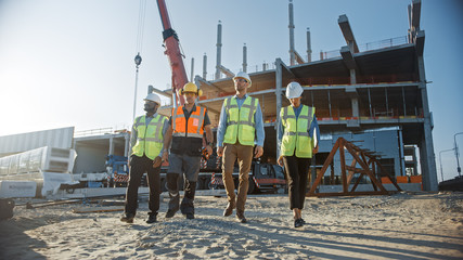 Wall Mural - Diverse Team of Specialists Inspect Commercial, Industrial Building Construction Site. Real Estate Project with Civil Engineer, Investor and Worker. In the Background Crane, Skyscraper Formwork Frames