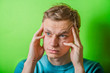 © aeroking - A young man having a headache