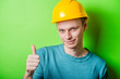 © aeroking - young man in a yellow helmet showing thumb up