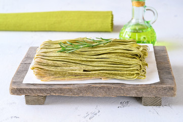 Canvas Print - Spinach fettuccine with fresh rosemary