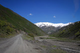 Fototapeta Natura - White peaks of Tian Shan mountains view near Fergana range, Kyrgyzia