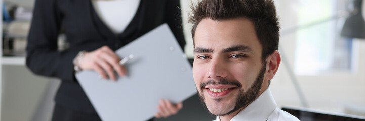 Wall Mural - Handsome smiling businessman in suit portrait at workplace look in camera. White collar worker at workspace, exchange market, job offer, certified public accountant, internal Revenue officer concept