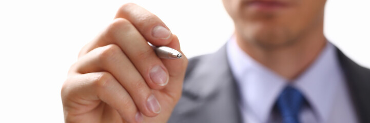 Wall Mural - Male arm in suit and tie point in camera tip of silver pen closeup. Sign gesture, read pact, sale agent, bank job, make note, loan credit mortgage investment, finance chief, legal law concept