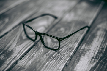 Canvas Print - Glasses for sight and vision correction and protection from computer on the wooden table