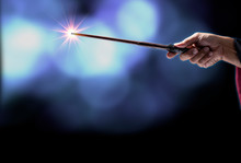 Magic Wand On Mysterious Background, Miracle Magical Stick Wizard Tool On Black