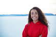 © Brocreative - Outdoor portrait of a beautiful mixed race teenage girl. Cute diverse head and shoulders photo of a real teen girl outdoors