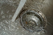 Close-up Of Running Water In Sink