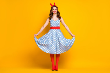 Canvas Print - Full size photo of cheerful lovely girl enjoy spring free time holiday weekend touch her polka-dot outfit shine stockings isolated over vivid color background