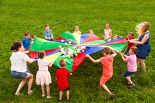 Kids In A Circle Playing Social Game