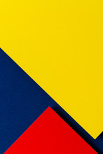 Abstract Colored Paper Texture Background. Minimal Geometric Shapes And Lines In Blue Navy, Red And Yellow Colours