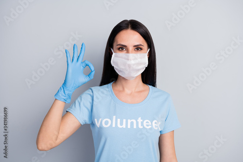 Close-up portrait of her she nice attractive content girl medic doc voluntary showing ok-sign ad advice choose choice isolated over grey pastel color background