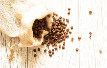  coffee beans in brown bag isolated on white background. culinary coffee still life.