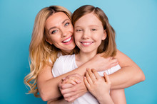Closeup Photo Of Two People Beautiful Mom Lady Little Daughter Hugging Best Friends Piggyback Holding Arms Spend Time Together Wear Casual White S-shirts Isolated Blue Color Background