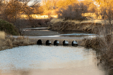 Wall Mural - Concrete bridge over a river in Northern California.