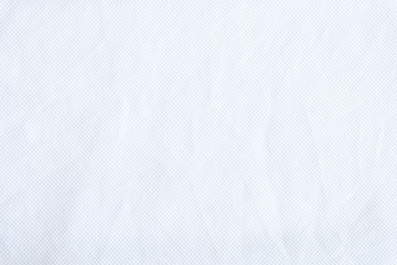 Wall Mural - White fabric close up shot of Cotton and polyester shirt. Casual wear over the weekend or summer time season. Background texture concept with copy space for text.