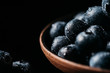 © Juan Garcia Risquez/ADDICTIVE STOCK - Fresh blueberries on wooden bowl on table