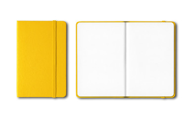 yellow closed and open notebooks isolated on white