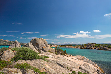 Panoramic view of the sunny beaches, and of the clear and transparent waters of the Maddalena island in Sardinia, Italy.