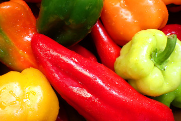 Close up macro photo of fresh and colourful bell peppers ready to be cooked