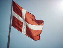 Low Angle View Of Danish Flag Against Clear Blue Sky