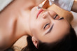 © Maksymiv Iurii - Young woman relaxes during spa treatments in beauty studio