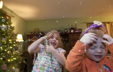 Cheerful Siblings During Christmas At Home