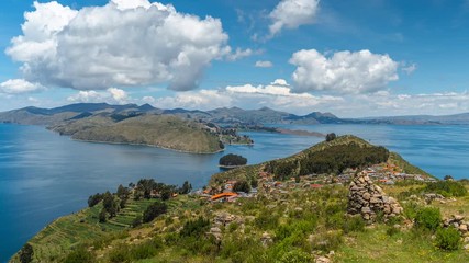 Wall Mural - Timelapse view of Sun Island (Spanish: Isla del Sol ), known as the birthplace of the sun and the Inca bloodline, on Lake Titicaca in Bolivia, South America, zoom in.