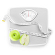 © Pixel-Shot - Weight scales with measuring tape and apples on white background. Slimming concept