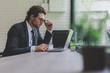 © bixpicture - Business caucasian men working from home. Handsome man work in modern office. Concept of business, technology and meeting online.