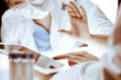 © rogerphoto - Coronavirus pandemic. Professional female scientist in protective eyeglasses researching tube with reagents in laboratory. Concepts of medicine and virus protection