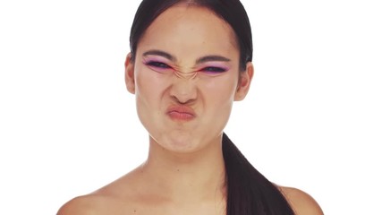 Sticker - A pretty young half-naked woman with bright fashion eye makeup is showing disgusting emotion to the camera isolated over white background