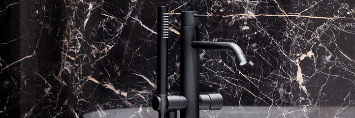 Wall Mural - stylish black bathtub faucet, panorama