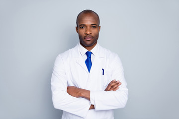 Wall Mural - Photo of serious doctor dark skin guy virologist biohazard agent corona virus conference arms crossed insist urgent quarantine wear white lab coat tie isolated grey color background