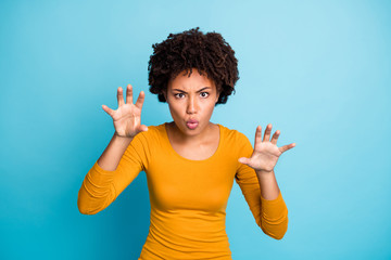 Poster - Portrait of funky frightening afro american girl want scary her friends on haloween party imagine she dangerous ghost wear good look jumper isolated over blue color background